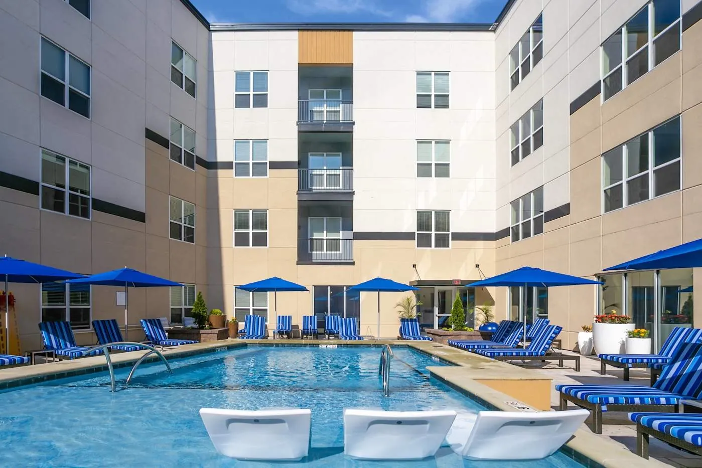 Pool deck and courtyard at The Aster in Beachwood