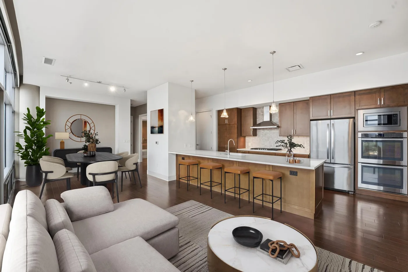 Living room and kitchen at One University Circle