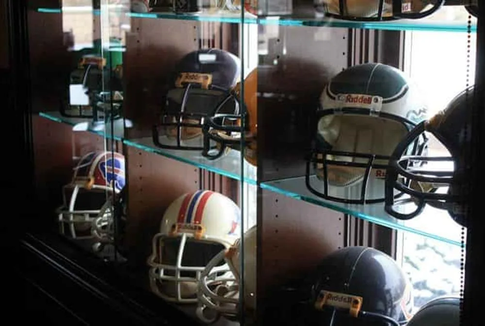 Football helmet display at Rivals Brew Pub
