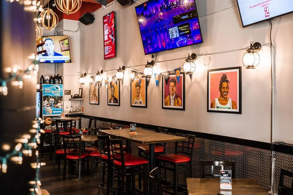 Interior and televisions at Whistle Taproom