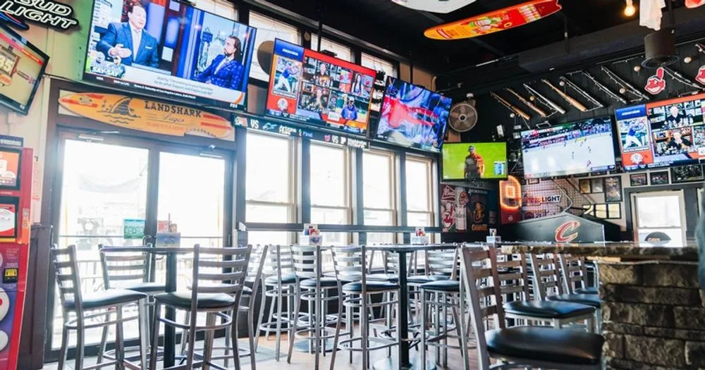 Televisions and seating at Game On Lakewood