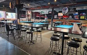 Pool tables and televisions at Rookie’s Sports Bar & Grill