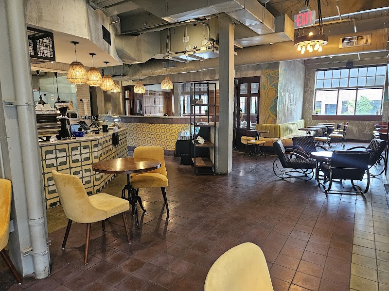 Seating and counter inside Green Goat Cafe Bar