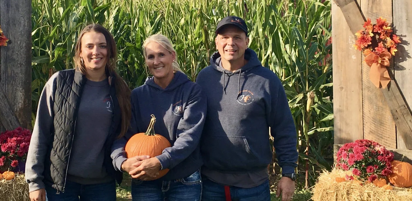 The Hornyak family with a pumpkin at the farm at Hornyak Farms in Chardon, Ohio