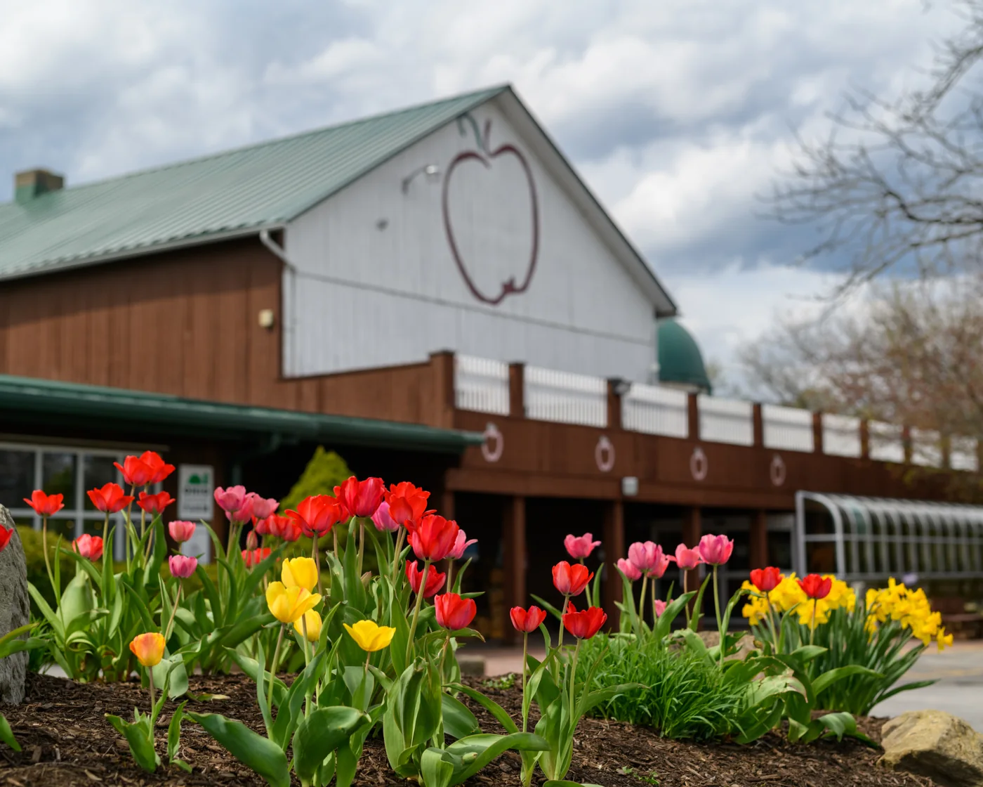 The farm market building and flowers at White House Fruit Farm in Canfield, Ohio