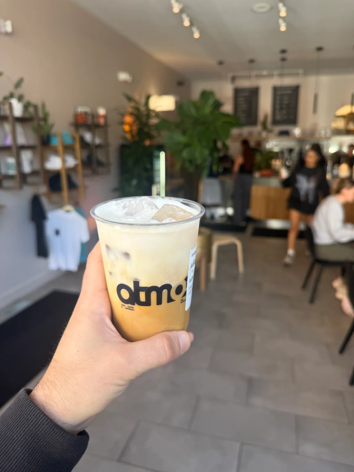 Iced latte inside Atmos Coffee