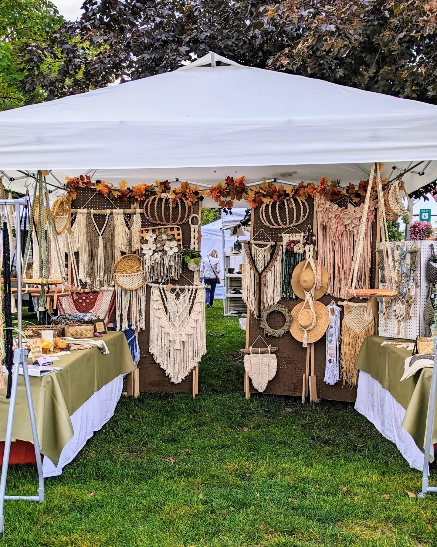 Macrame and fiber art vendor booth at the Harvest Handmade Market on Chardon Square in Chardon