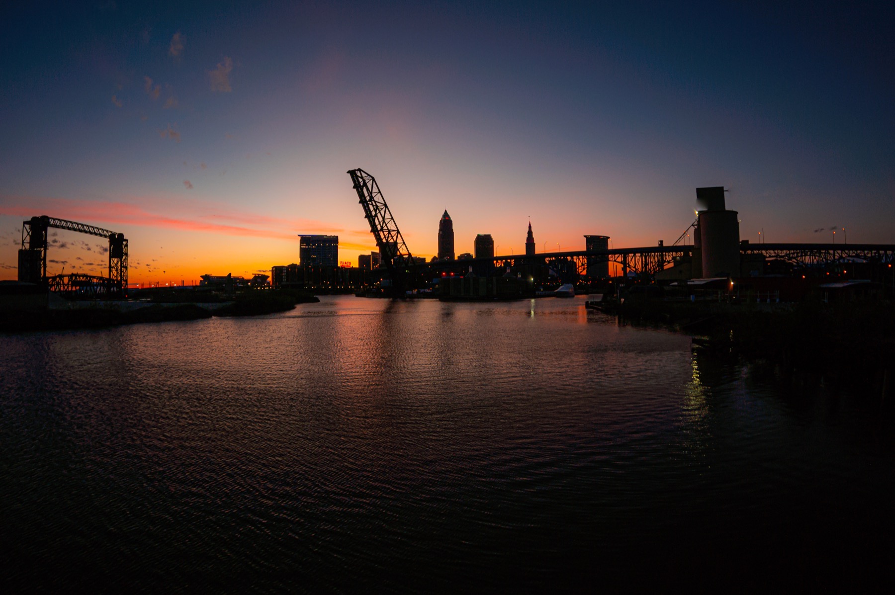 Cleveland skyline at sunrise over the Cuyahoga River
